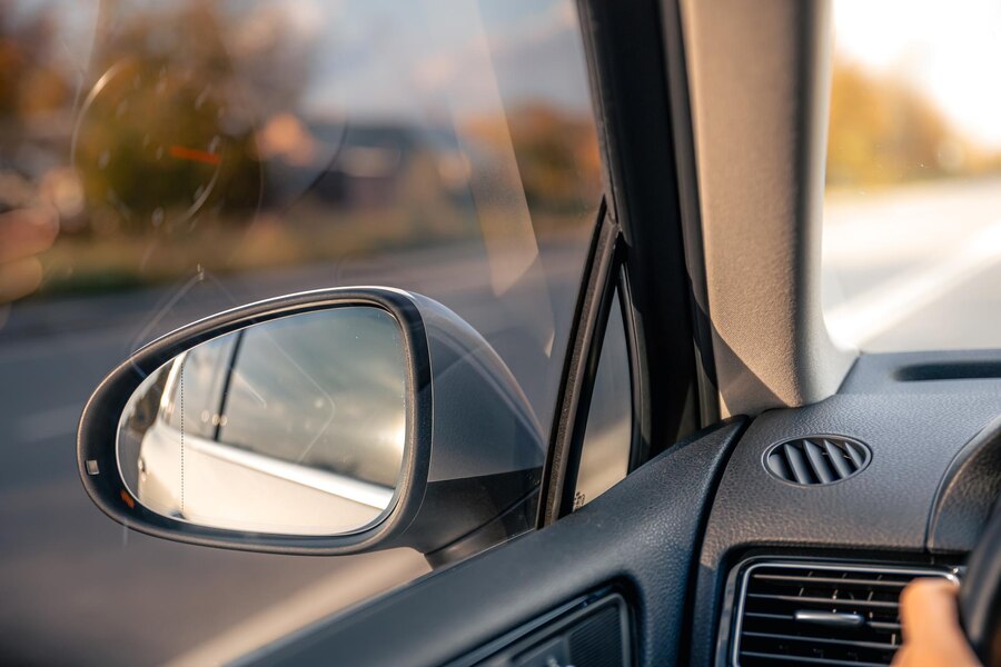 rear view mirror view from inside the car